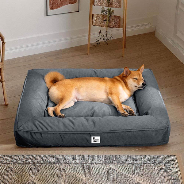 Grey waterproof fully enclosed dog bed with raised bolstered edges