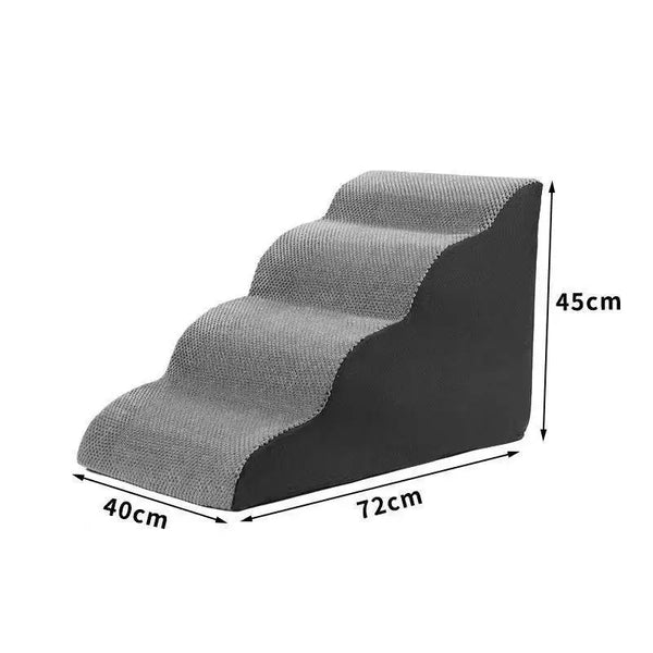 Foam pet stairs with a removable fleece cover beside a bed