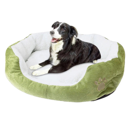 Green faux-fur donut pet bed with raised rim